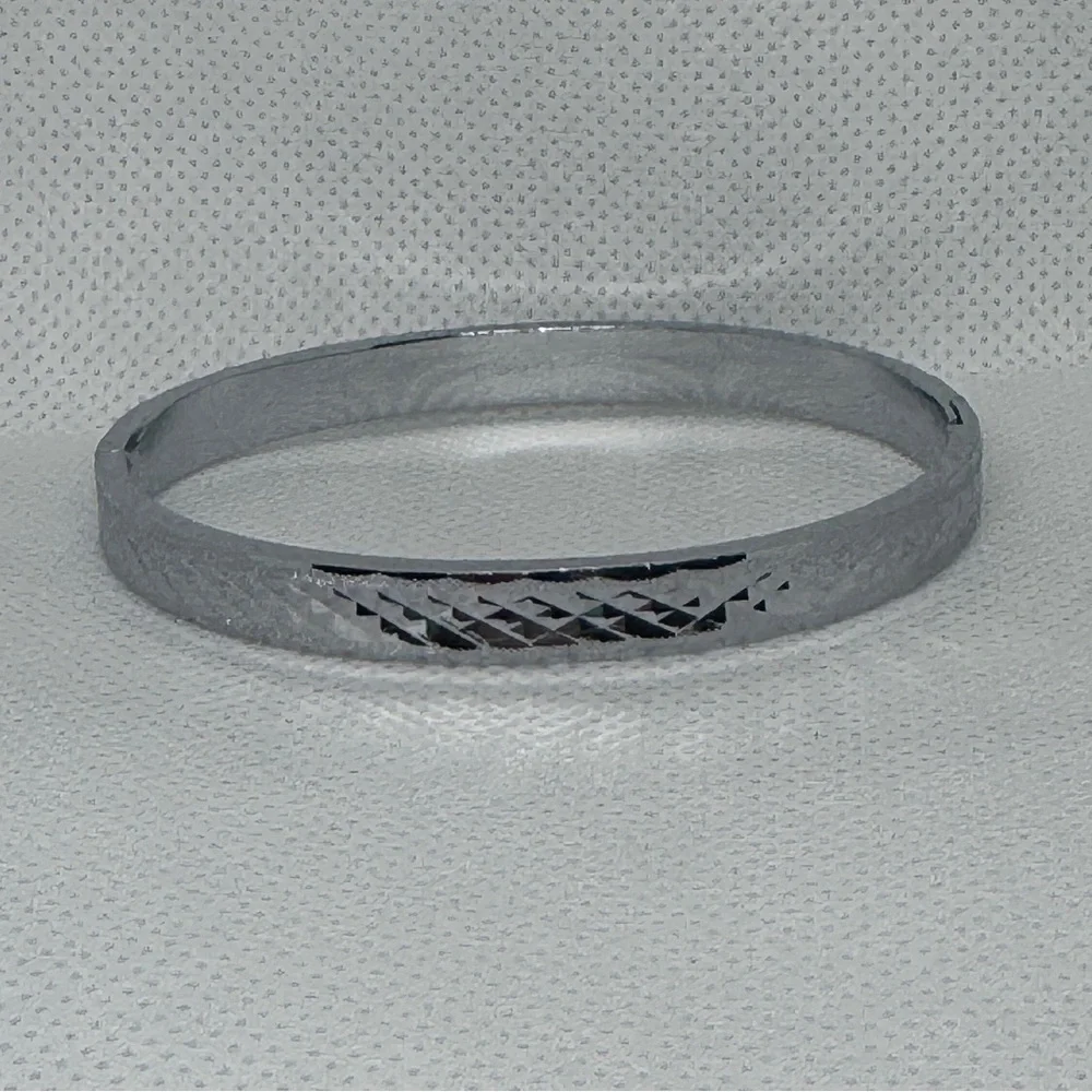 Silver Tone Hinged Bangle Bracelet with Etched Geometric Detail